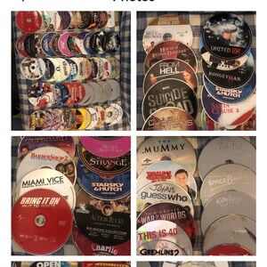 Mixed lot of various scratched/damaged DVD movies.